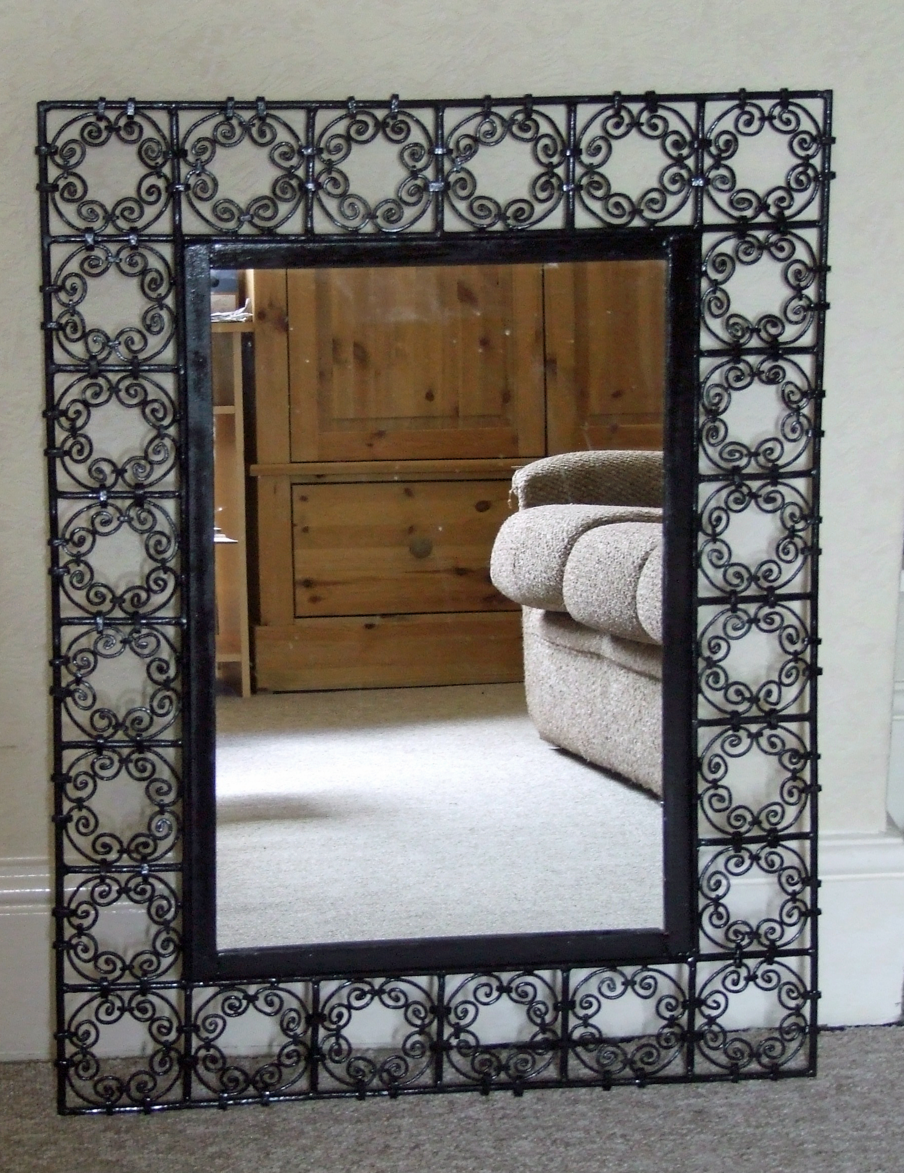 Large metal framed mirror. Bill Bagley Glass