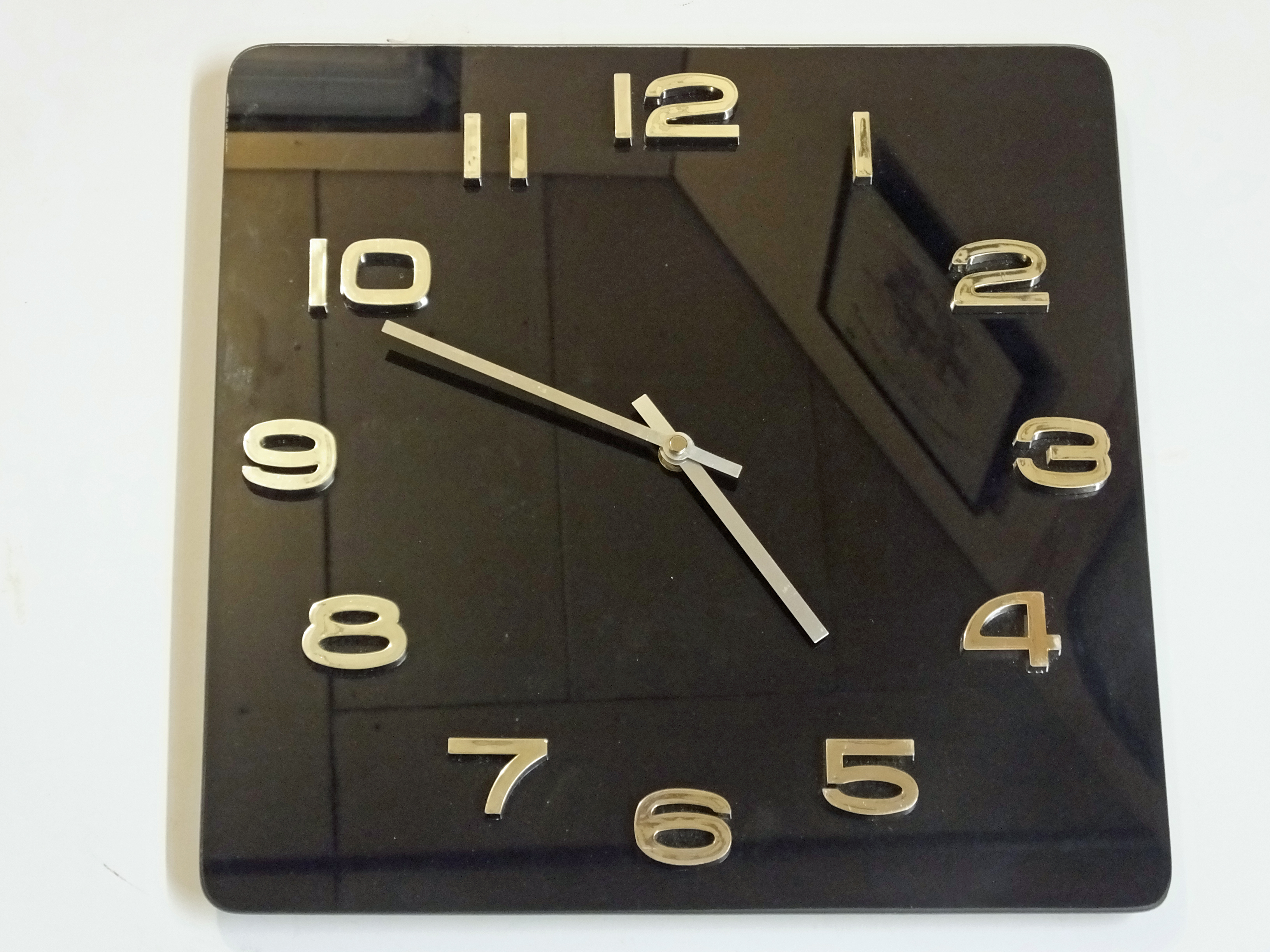 Black glass face wall clock. Bill Bagley Glass