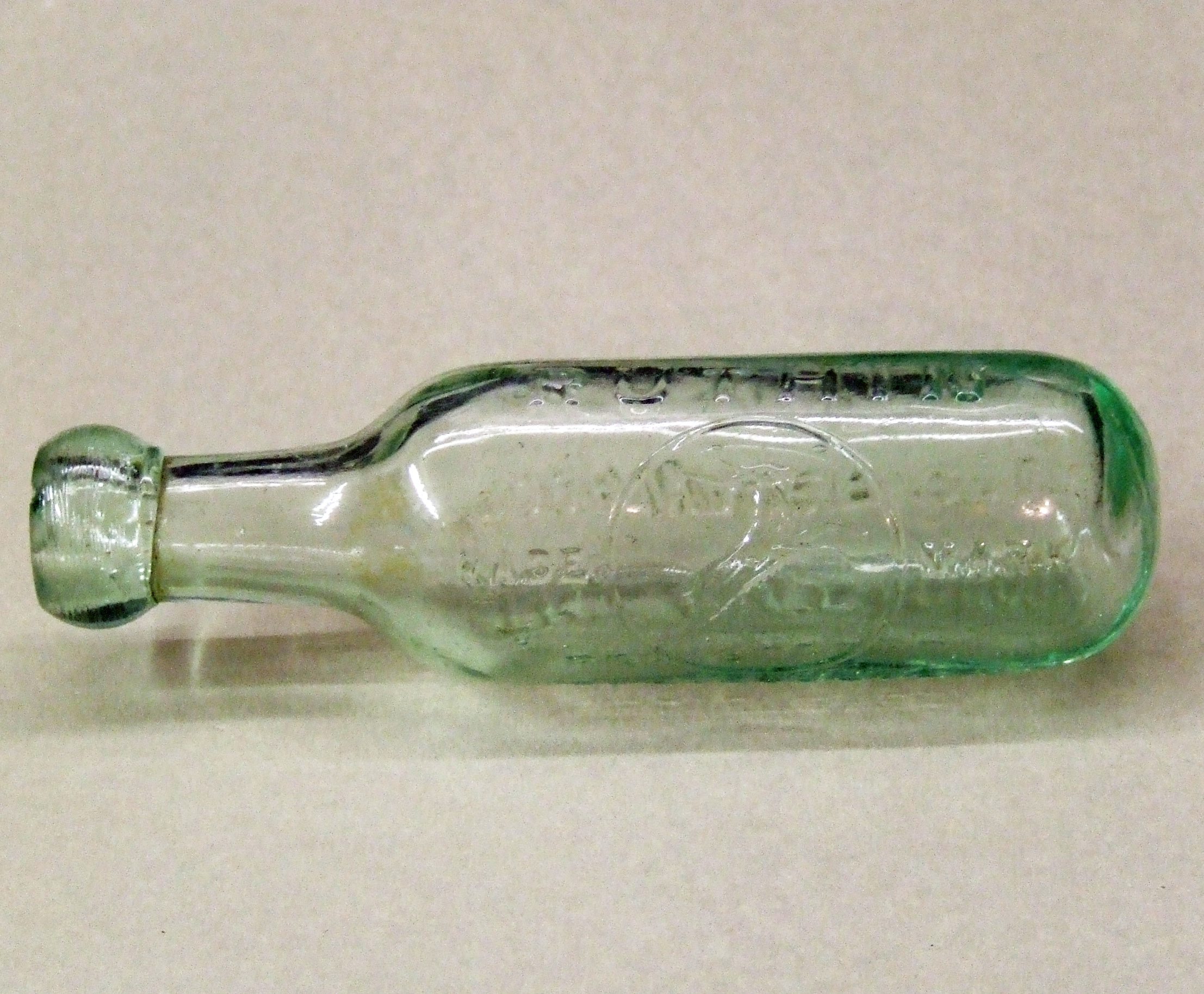 Blob top Mineral water bottle. Bill Bagley Glass