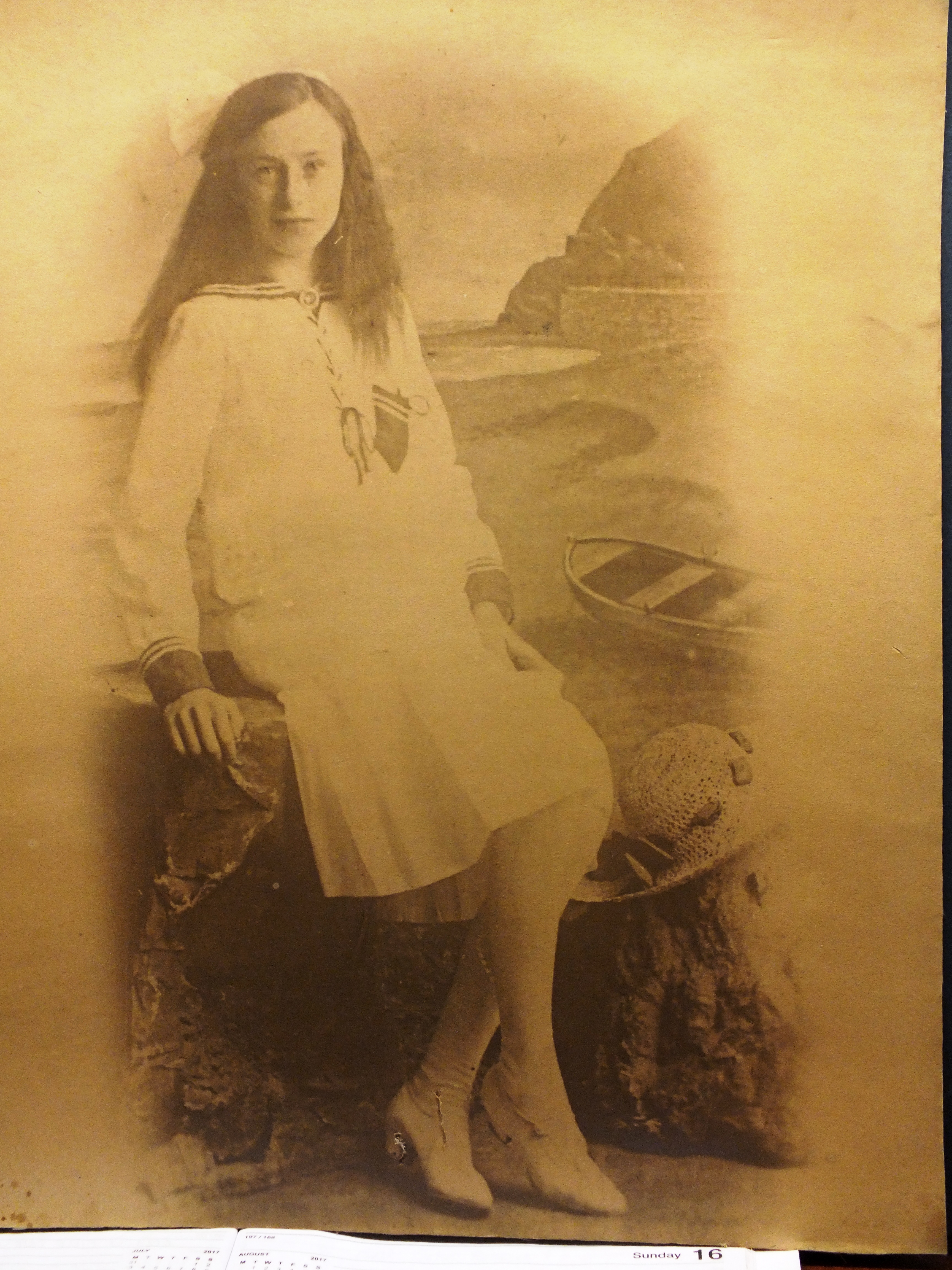 Girl sitting on a rock. Bill Bagley Rocks and Minerals